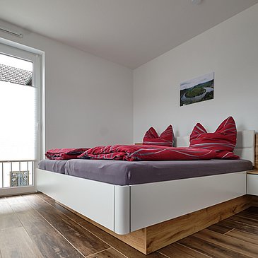 Schlafzimmer mit Doppelbett
